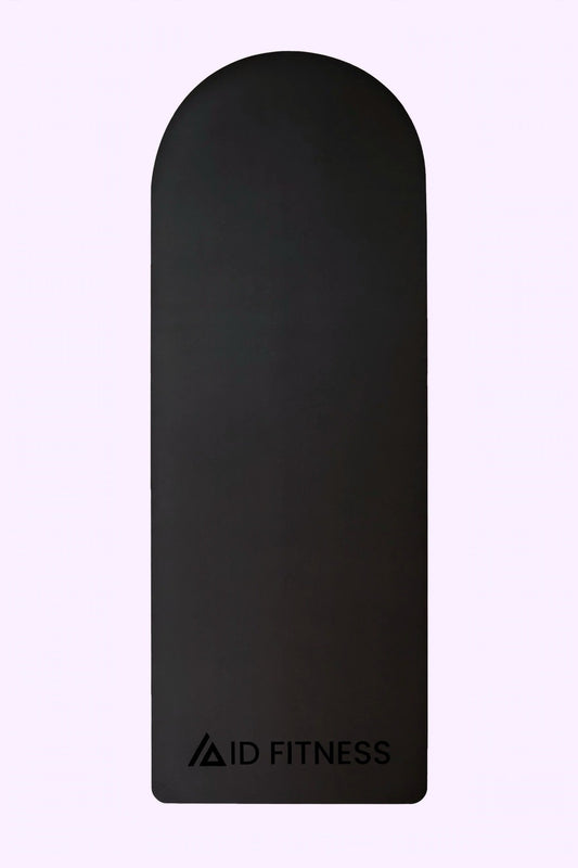 ID Yoga Mat – black yoga mat with arch top and laser-pressed ID logo